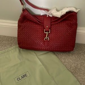 Never Used CLARE Woven Leather Handbag. Inside pockets with gold metel detail